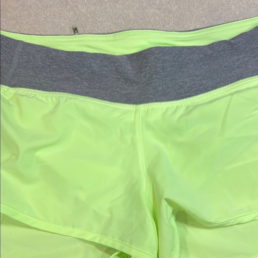 Neon Green Women's Shorts Lululemon size 10 zipper pocket in back